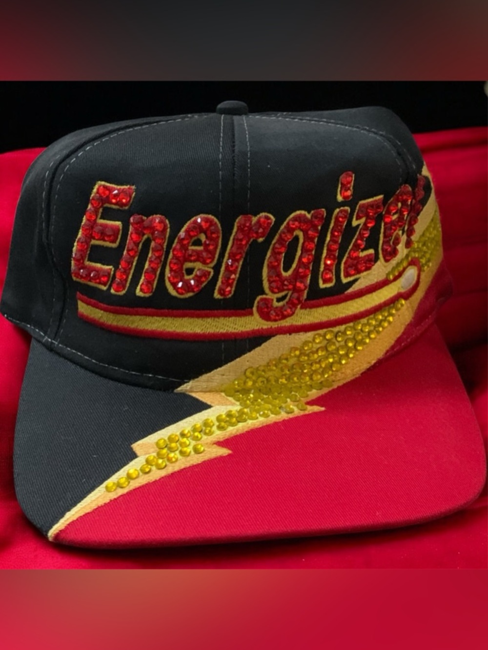 Black & Red energizer Snapback Hat with Yellow Lightning Accent